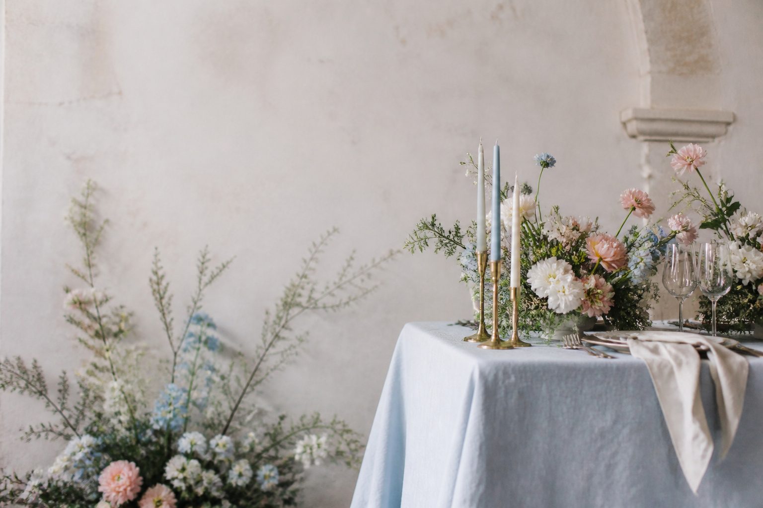 An outdoor wedding setup with various spring color palettes.